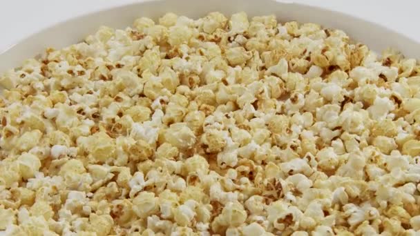 A bowl of tasty popcorn - Кадры, видео