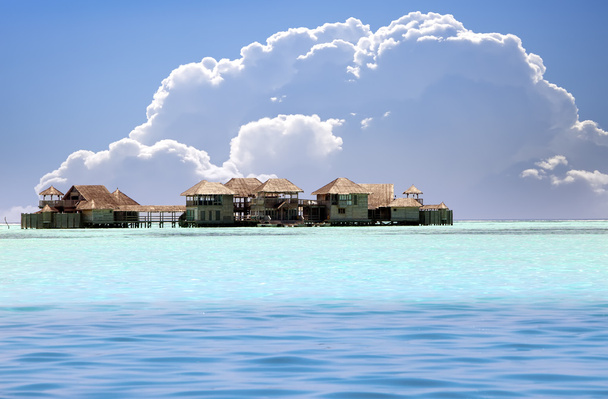 Houses over transparent quiet sea water- tropical paradise, Maldives - Photo, Image