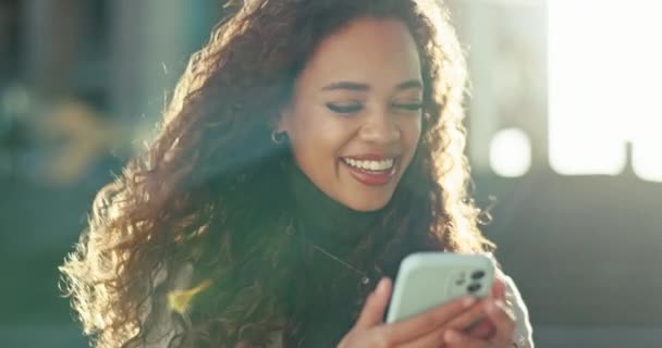 Happy, woman and laughing with phone text in city outdoor with internet message and social media scroll. Funny joke, female person and mobile with a smile with networking and website app post. - Footage, Video