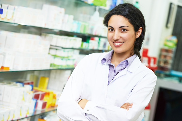 Pharmacy chemist portrait in drugstore - Фото, изображение