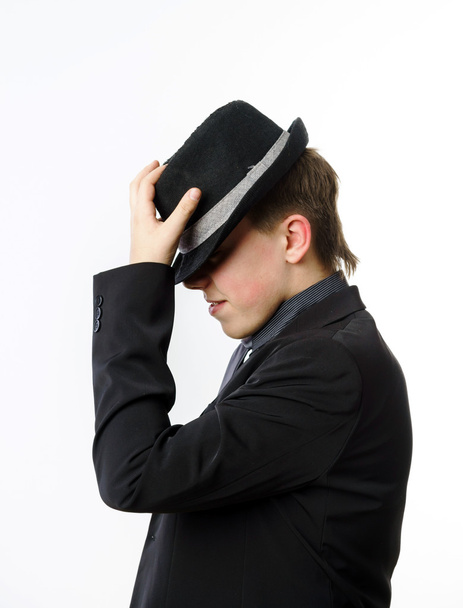 Expressive teenage boy dressed in suit - Фото, изображение