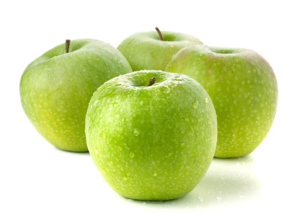 Cuatro manzanas verdes maduras
 - Foto, imagen