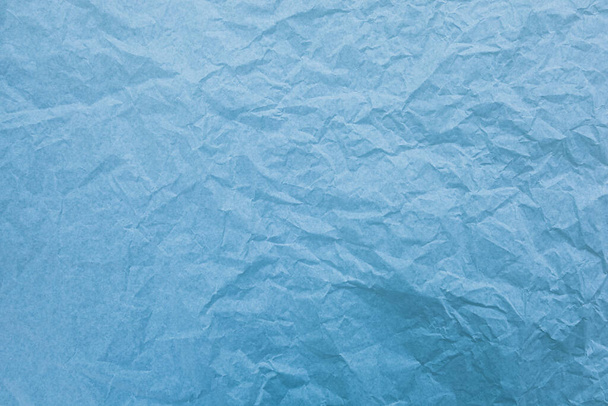 Blaues Papier mit Falten Textur Hintergrund - Foto, Bild