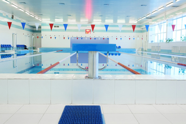 Interior of a public swimming pool - Фото, изображение