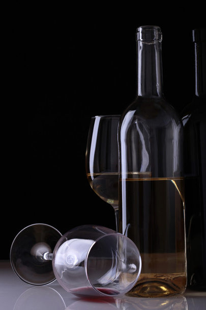Wine bottles and glasses - Фото, изображение