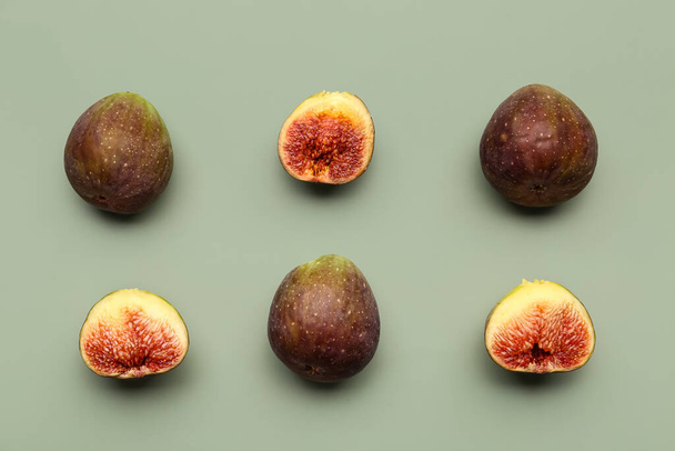 Fresh ripe figs on green background - Photo, Image