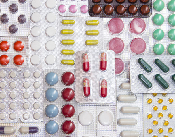 background of tablets, capsules and vitamins in blisters - Photo, image