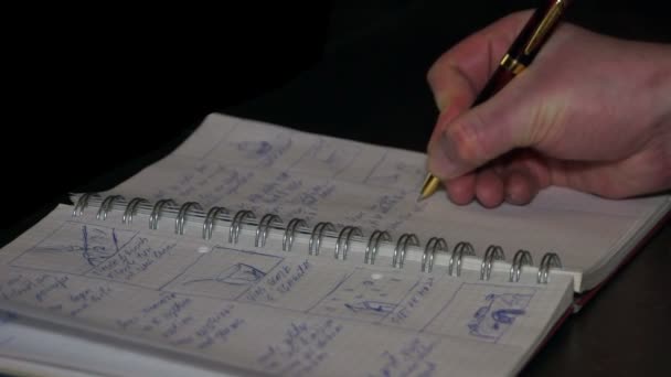 Długopis, notatnik, ręka - Materiał filmowy, wideo