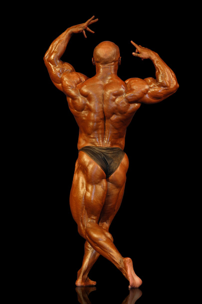 М'язистий чоловік назад
 - Фото, зображення