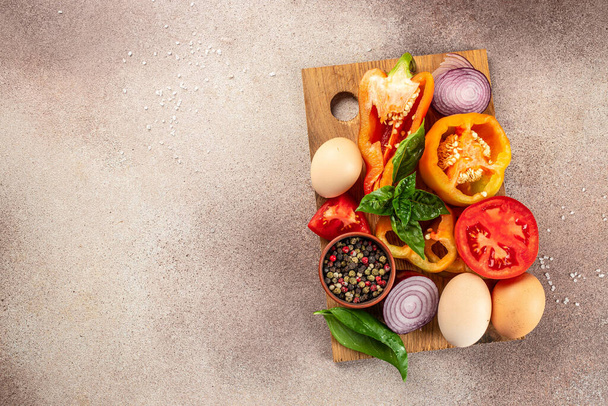 Ingredients for making shakshuka on a wooden board, banner, menu, recipe place for text, top view, - Photo, Image