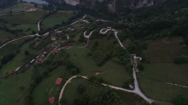The village of Spajici and the village of Lazici, a small village with a couple of houses, with lake Spajica, near lake Zaovine. Aerial. Summer.  - Footage, Video
