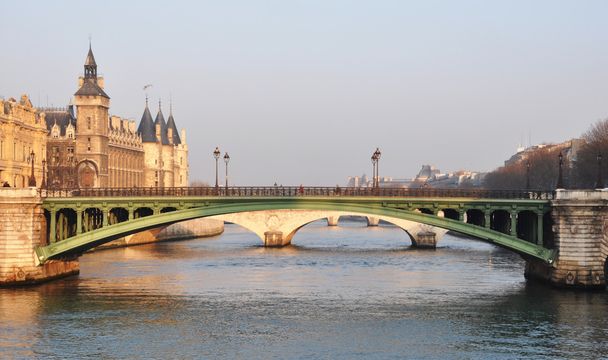 Notre-Dame bridge and the Conciergerie in Paris - Photo, Image