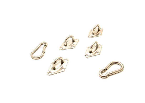Snap hook clips and pad eyes in sun shade sail hardware kit, line cable wire chain runs through, self-closing locking connectors heavy duty stainless steel isolated on white background. Clipping path - Photo, Image