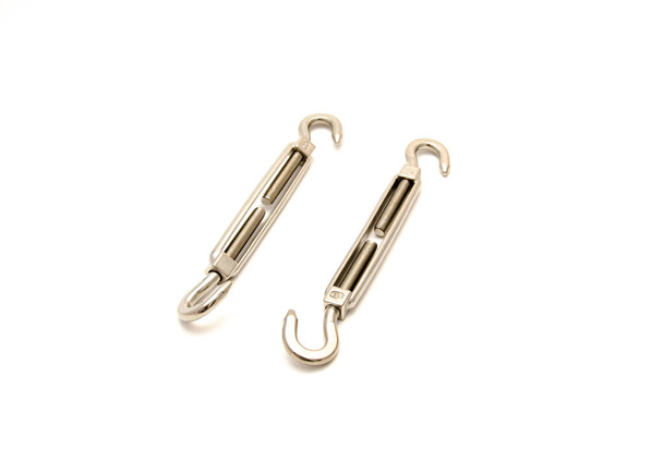 Two turnbuckles in sun shade sail hardware kit for cable wire rope, chain tension, heavy duty stainless steel isolated on white background. Adjusting the tensioning systems clipping path copy space - Photo, Image