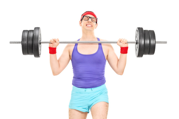 Athlete attempting to lift weight - Foto, Bild