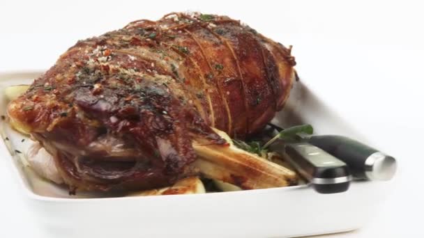 Roast leg of lamb with garlic - Footage, Video