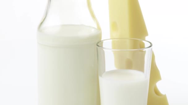 Bottle of milk and glass of milk - Footage, Video
