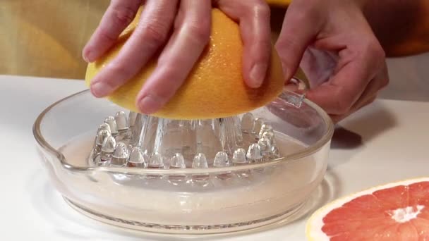 Squeezing pink grapefruit - Footage, Video