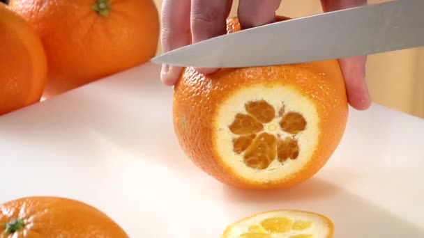 krojenia pomarańczowy - Materiał filmowy, wideo