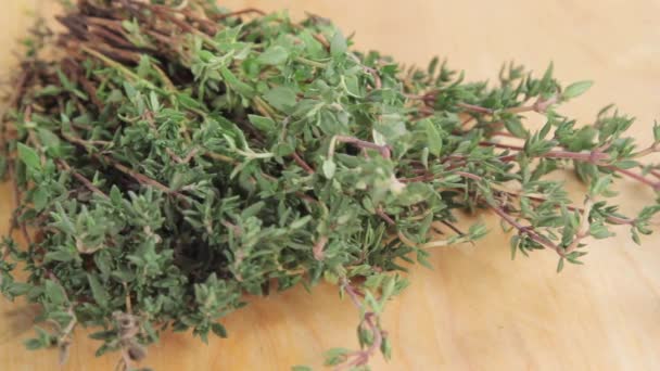 Fresh thyme on wooden table - Footage, Video
