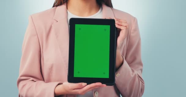 Green screen, tablet and hands of woman in studio with space, offer or news on blue background. Digital, presentation and lady model show sign up, platform or service promo, deal or coming soon info. - Footage, Video