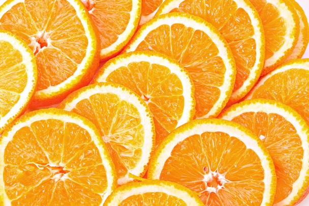 Many sliced oranges - Foto, immagini