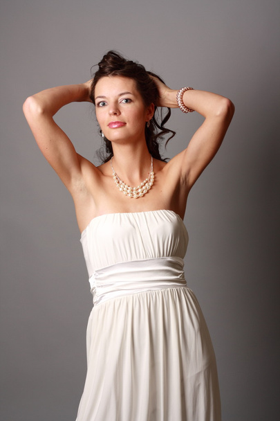 Beautiful young girl in a beautiful dress - Foto, afbeelding