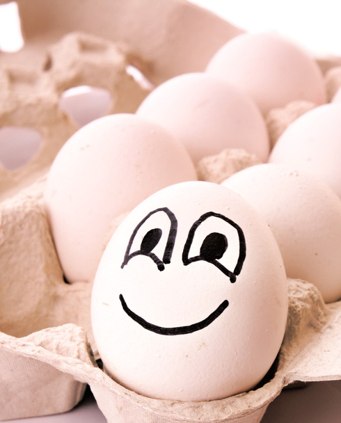 Different egg with smile - Foto, afbeelding