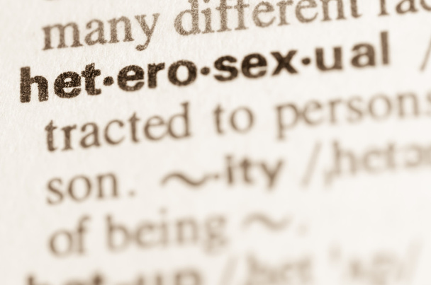 異性愛者の単語の辞書の定義  - 写真・画像