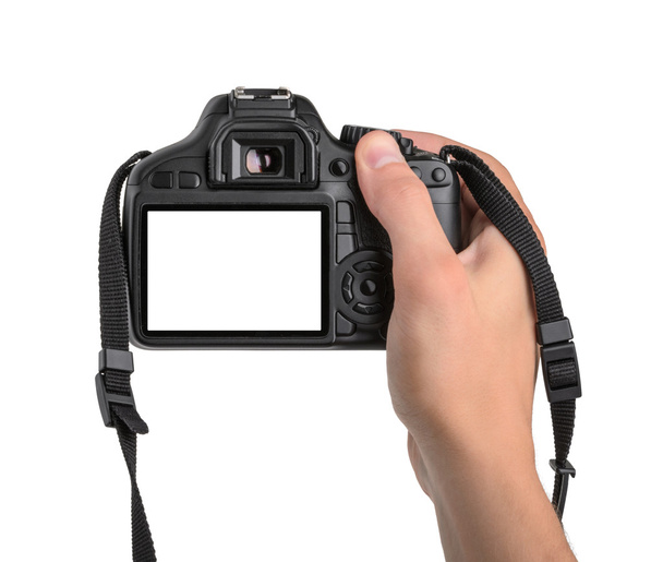 DSLR fényképezőgép a kézben, elszigetelt - Fotó, kép
