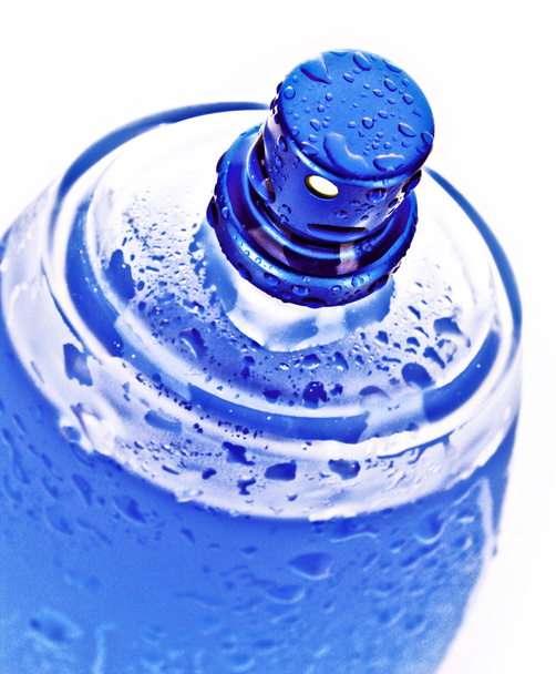 Blue perfume bottle white background - Valokuva, kuva