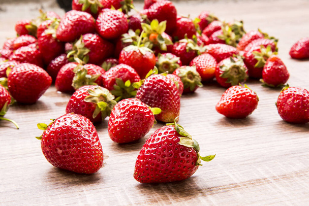 Fresh strawberries on wooden table - Photo, Image