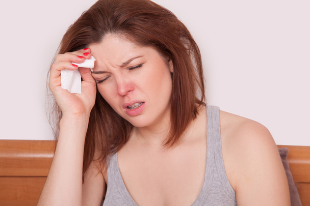 Sick Woman. Flu. Woman Caught Cold. Sneezing into Tissue. Headache. Virus. copy space - Zdjęcie, obraz