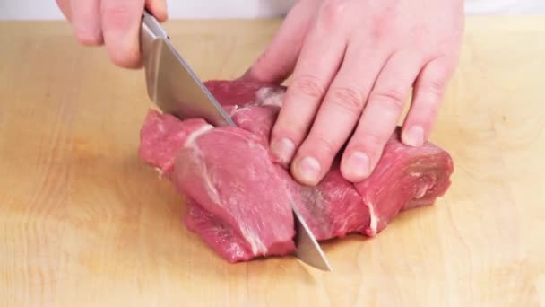 Lamb being sliced on cutting board - Footage, Video