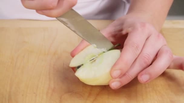 A peeled apple being quartered - Footage, Video