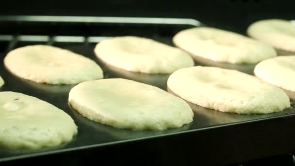 Madeleines baking in the oven - Footage, Video