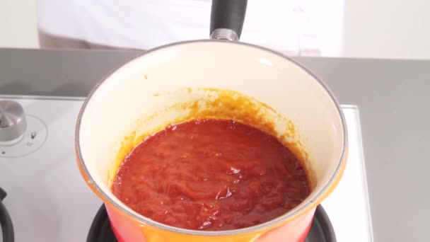 Syrup being added to barbecue sauce - Video, Çekim