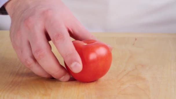 Sekání červené rajče - Záběry, video