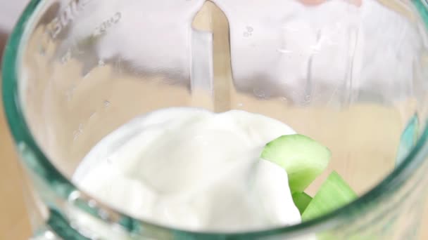 Yogurt and cucumber being seasoned - Footage, Video