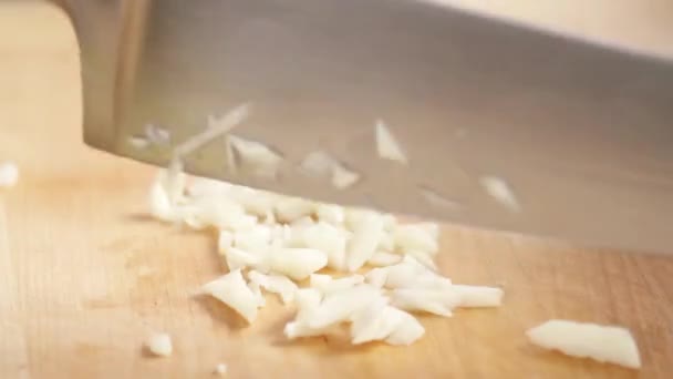 Garlic being finely chopped - Imágenes, Vídeo