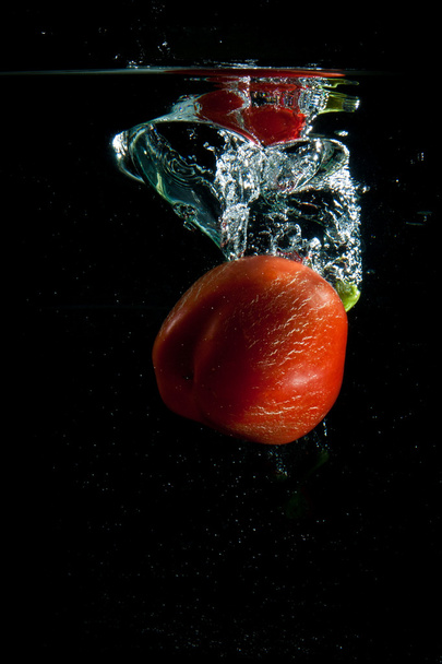 Pepper into water. - Fotó, kép
