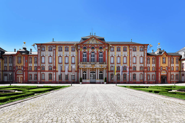 Bruchsal, Germany - August 2023: Front view of Baroque castle called Bruchsal Palace on sunny day - Фото, изображение