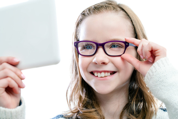 Girl trying new glasses. - Photo, Image