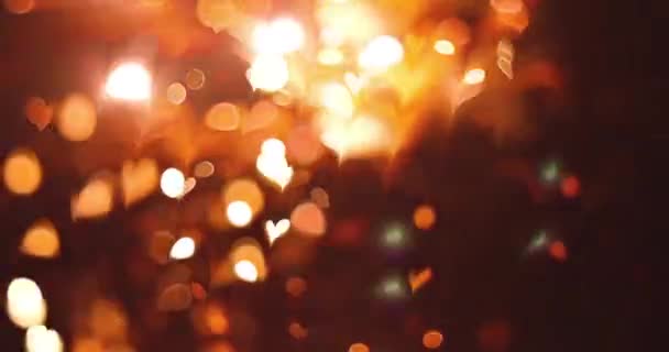 Coeur lumineux avec effet bokeh sur fond noir. Romantic Abstract Motion Background. Saint Valentin, Événement de festival, Mariage, Confettis, Noël, Diwali, Fête, Nouvel An. - Séquence, vidéo