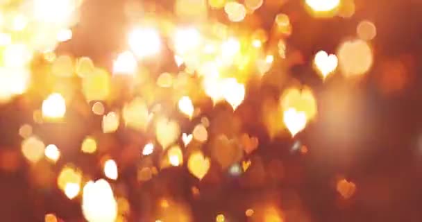 Siyah arka plan üzerinde bokeh etkisi olan parlayan bir kalp. Romantik Soyut Hareket Arkaplanı. Sevgililer Günü, Festival, Düğün, Noel, Diwali, Kutlama, Yeni Yıl. - Video, Çekim