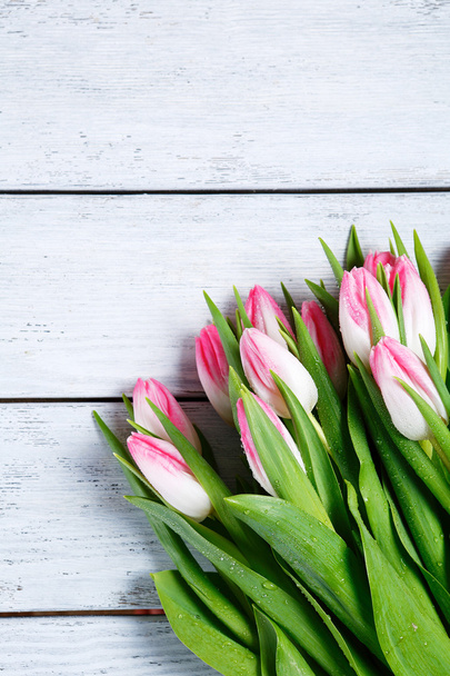 bouquet of spring flowers on white boards - Fotografie, Obrázek