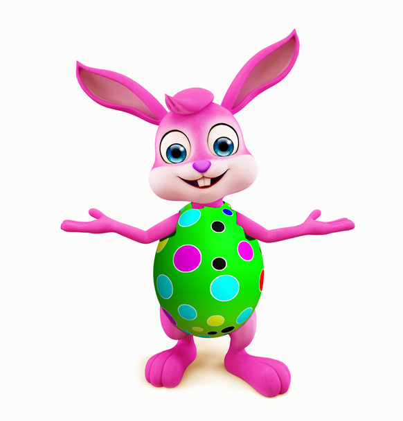 Coniglietto di Pasqua con uova colorate presentazione posa
 - Foto, immagini
