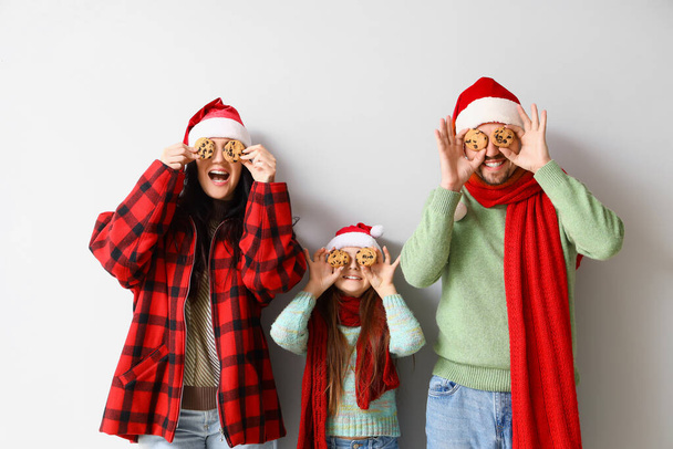 Boldog család karácsonyi cookie-k a könnyű háttér - Fotó, kép
