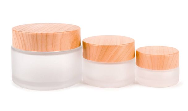 Ensemble de pots cosmétiques sur fond blanc - Photo, image