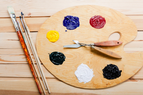 Palette with oil paint and brushes - Photo, Image